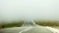 Road under the mist Royalty Free Stock Photo