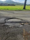 the road is very dangerous and potholes