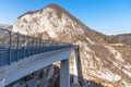 Road viaduct in the European Alps and blue sky in winter