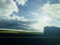 Road view with road, asphalt, clouds, and truck in France Europe