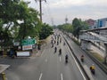 Road view in Jakarta City, motorcycle running on the highway