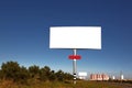 Road in a village with an empty billboard Royalty Free Stock Photo