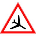 Road warning sign. Sign caution low flying aircraft. Royalty Free Stock Photo