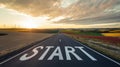 Road with a white start sign on it Royalty Free Stock Photo