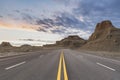 Road through the wind erosion physiognomy in sunset