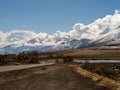 Road winding through Carson Valley near Genoa Nevada along snowcapped mountains. Royalty Free Stock Photo