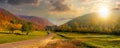road winding through the country valley at sunset Royalty Free Stock Photo