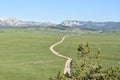 The road winding and disappearing at the distance,the Durmitor mountain at the background Royalty Free Stock Photo