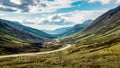 Road winding through Scottish Mountains. Bus driving the road to Torridon in Scottish Highlands. Western Scotland Royalty Free Stock Photo