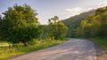 road winds through the lush green countryside