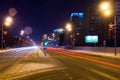 Road in the winter night, city, cars, lights, speed Royalty Free Stock Photo