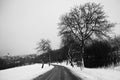 Road in winter. Snowy mountain path for a car. Concept for traveling and safe driving in winter by car Royalty Free Stock Photo