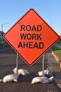 Orange ROAD WORK SIGN sign Royalty Free Stock Photo