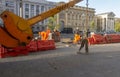 Road work, laying paving slabs on Independence Avenue