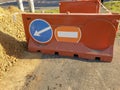 Road work on the sidewalk. Warning road signs on the fence around the pit on the road Royalty Free Stock Photo