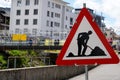Road work sign for reconstruction of a bridge in Einsiedeln, Switzerland.