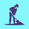 Road worker digging with shovel Royalty Free Stock Photo