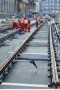 Road workers repair the tram line in Prague