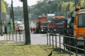Road workers are repairing the road at while road traffic with the use of road equipment. Road works Royalty Free Stock Photo