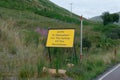 Road workers safety sign at roadworks in rural area Royalty Free Stock Photo