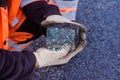 Road workers take a cube of asphalt Royalty Free Stock Photo