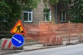 Road works on the city street. Road work and detour signs. Royalty Free Stock Photo