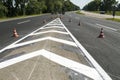 Road marking and  traffic signs during repair and pain Royalty Free Stock Photo