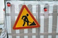 Road works sign for construction works in city street Royalty Free Stock Photo