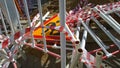 Road works sign denoting construction work and damaged metal fencing on the ground. Construction site. Restoration and reconstruc Royalty Free Stock Photo