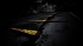 a road with yellow arrows painted on it in the dark