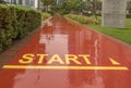 Road with yellow start sign.