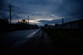 The road in the zavodsky district at sunset after the rain Royalty Free Stock Photo