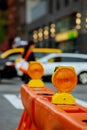 Roadblock or construction site lock with signal on a road. Red and white street barricade