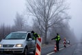 A roadblock that restricts the movement of people between counties