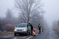 A roadblock that restricts the movement of people between counties