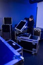 Roadie unpacking a dj mixing table Royalty Free Stock Photo