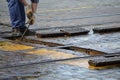 Roadman repairs streetcar rails Royalty Free Stock Photo