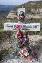 A roadside cross marks the spot where another life was claimed on the notoriously dangerous roads of Ecuador.