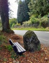 Seat with stone footrest