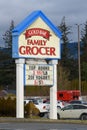 Roadside sign for Gold Bar Family Grocer grocery store