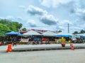 A roadside stall and a complex Padang Waremart near at the Thailand border in Perlis, Malaysia.
