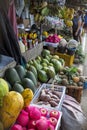 A roadside stall selling watermelons, sweet potatoes, papayas, pineapples and other locally harvested fruits. Royalty Free Stock Photo