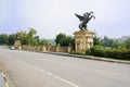 Roadside statue of flying horse in suny autumn Royalty Free Stock Photo