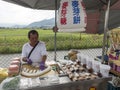 A roadside vendor selling maltose candy biscuit on Taichung of Taiwan.