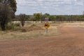 Roadside warning sign advising of unfenced animals. Royalty Free Stock Photo