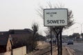 Roadside welcome banner inviting you to visit the Soweto area of Johannesburg