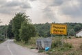 Roadsign indicating the entrance to Parcani on the main street of the place.