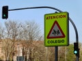 Roadsign protecting kids from cars hazard on the street of Lavapies district of Madrid, Spain.