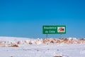 Roadsign Republica de Chile on the road with snow at the border with Bolivia