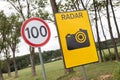 Roadsign Speen limitation one hundred km and tablet with radiolocator Royalty Free Stock Photo